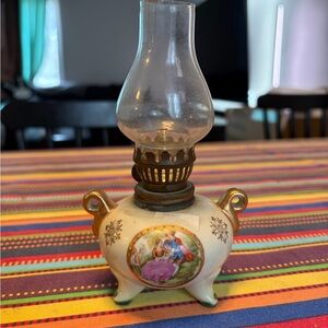 Vintage Cream Oil Lamp with Decorative Design